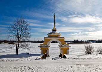 A view of the Bishop's Wharf. The Nilov-Stolobenskaya Hermitage on Lake Seliger, on Stolobny Island, on a sunny winter day. Tver Oblast, Russia.
