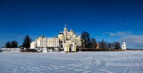 The Nilov-Stolobenskaya Hermitage on Lake Seliger, on Stolobny Island, on a sunny winter day. Tver Oblast, Russia