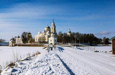 The Nilov-Stolobenskaya Hermitage on Lake Seliger, on Stolobny Island, on a sunny winter day. Tver Oblast, Russia