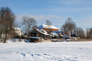 Houses on the shore of Lake Seliger. Svetlitsa village. Sorozhskoye rural settlement. Ostashkovsky district. Tver region, Russia.