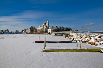 The Nilov-Stolobenskaya Hermitage on Lake Seliger, on Stolobny Island, on a sunny winter day. Tver Oblast, Russia
