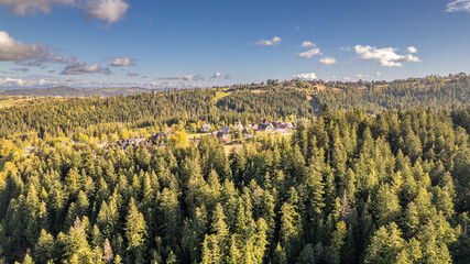 Mountain Valley with Village and Forest, Aerial View in Poland