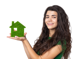 Happy house buyer. A young girl holds a model of a green house in her hands. The concept of green energy, ecology.