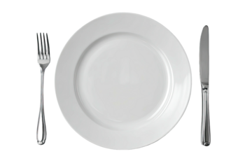 Empty white plate with fork and knife on black background