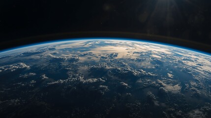 Fototapeta premium Stunning view of planet Earth illuminated by sunlight from outer space.