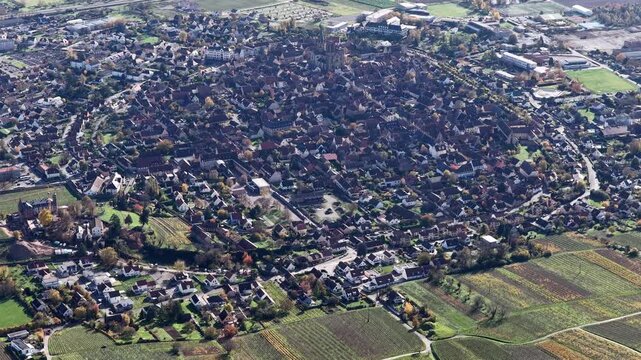 Aerial view of the town of Rouffach showing the architecture and layout of the town, with surrounding fields, Rouffach, Grand Est, France.