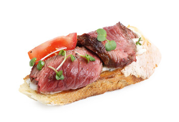 Delicious bruschetta with roast beef, cream cheese, tomato and microgreens isolated on white