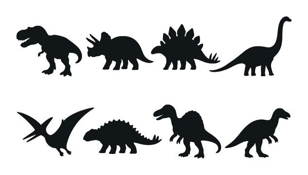 Silhouettes of prehistoric dinosaurs on dark background