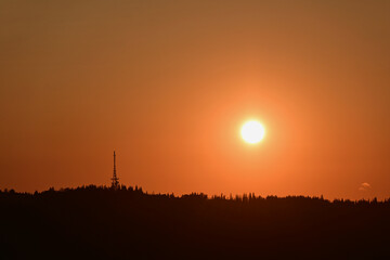 Fototapeta premium Scenic sunset over Gubalowka, Zakopane, Poland. View of the slope of Gubalowka with its characteristic tower - The Zakopane-Gubałowka transmitter, a facility for FM and TV transmission