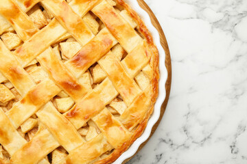 Tasty homemade apple pie on white marble table, top view. Space for text