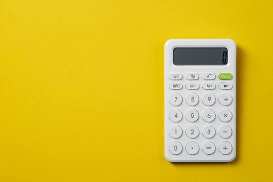 A calculator with copy space. Financial analysis, budget and accounting processes. Finance, tax season, or business planning/