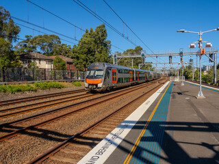 Fototapeta premium 5 November 2025 passenger Train going through Summer Hill train station a suburban Sydney train Station NSW Australia