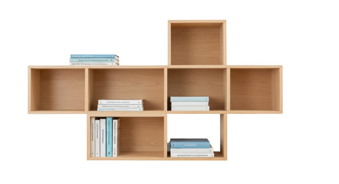 Modern light wood cube shelving unit isolated, contemporary bookcase with books for home decor and interior design projects
