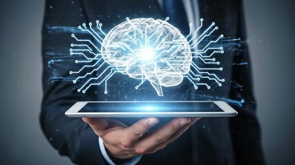 A businessman holds a tablet displaying a glowing digital brain hologram with circuit connections symbolizing artificial intelligence innovation and the future of business technology and data analysis - Powered by Adobe