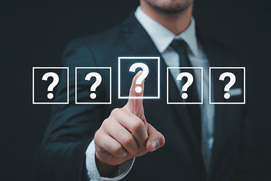 Business decision making concept with question mark symbols and man in suit choosing option 100 - Powered by Adobe