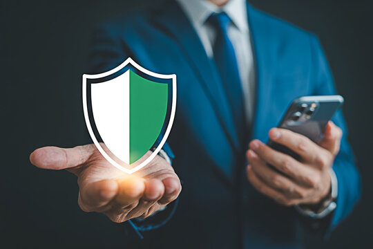 Cybersecurity protection for mobile phone data and privacy with business man holding shield icon