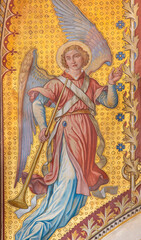 Obraz premium Vienna - The fresco of angel with the tompeth in the Votivkirche church by brothers Carl and Franz Jobst (sc. half of 19. cent.).