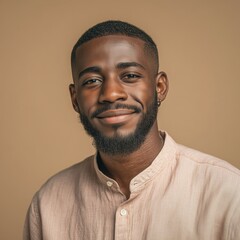 Obraz premium Smiling Young Man in Casual Shirt on Brown Background