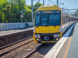 Naklejka premium 5 November 2025 passenger Train going through Summer Hill train station a suburban Sydney train Station NSW Australia