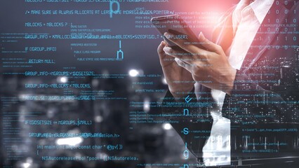 A professional man holds a smartphone against a backdrop of digital data and code. The night city setting highlights themes of technology and innovation in modern business. Xenic
