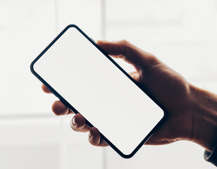 hand holding black smartphone