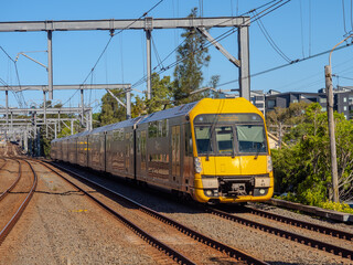 Obraz premium Passenger Train going through Summer Hill train station a suburban Sydney train Station NSW Australia