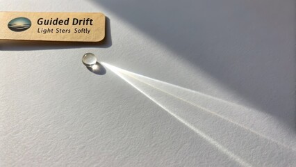 Light Reflection and Refraction with Glass Sphere on White Surface Creating Beautiful Ray Patterns in Natural Light