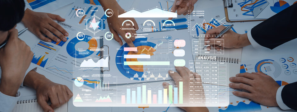 A diverse team collaborates on data reports, using charts and graphs to strategize for business growth and performance enhancement in a modern office setting. Trope - Powered by Adobe