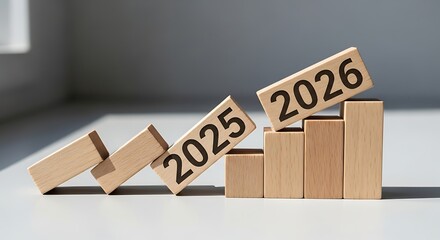 transition from 2025 to 2026 with wooden blocks growth concept.