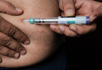 Basrah, Iraq - November 5, 2025: Subcutaneous Self-Injection of Tirzepatide (Mounjaro) Using a...