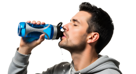 Refreshing break: Athletic man stays hydrated with a sip from a blue water bottle after workout, vital for health.