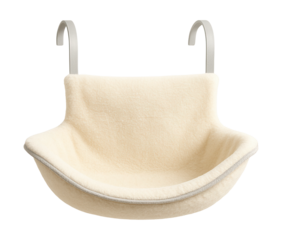 Hammock cat bed hangs on a radiator, providing warmth for pets in a cool home.