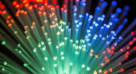 A colorful array of fiber optic cables with a black background.