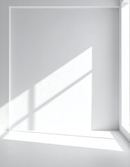 Minimalist empty white room with light and shadows creating stark contrasts