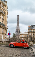 The eiffel tower in Paris from a tiny street