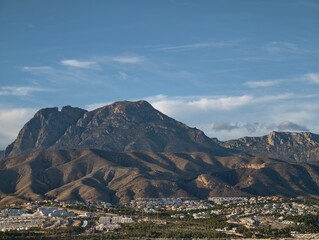 Fototapeta premium majestic mountain crest dominates suburban landscape with picturesque vistas and outdoor paths