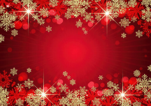 Red Christmas background with a border of sparkling gold glitter and red snowflakes, with bokeh lights and copy space.