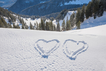 two love hearts carved in the snow, Wallberg mountain