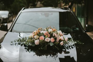 wedding bouquet on the car