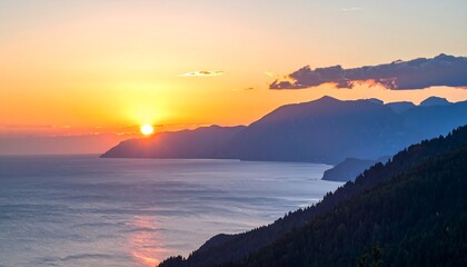 Scenic sunset over mountains and sea