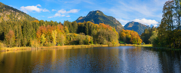 stunning autumn landscape lake Moorweiher, Oberstdorf, hiking destination bavaria Allgau alps