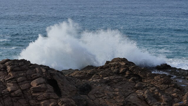 ocean and its power crashing against the cliffs - Powered by Adobe