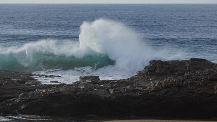 ocean and its power crashing against the cliffs