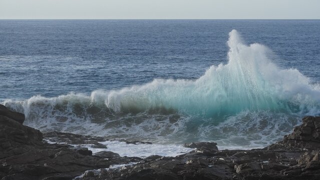 ocean and its power crashing against the cliffs