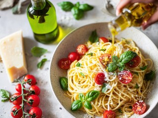 Delicious spaghetti with fresh tomatoes and basil, drizzled with olive oil