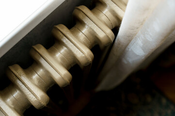 Vintage Radiator by the Window, heating concept, with copy space