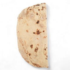 Top view of dry Stale Flatbread or chapati isolated on a white background. Leftover bread top view
