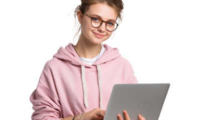 Woman and girl working on laptops in office setting