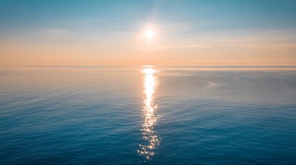 Tranquil Ocean Horizon with Golden Sun Reflection on Water Surface
