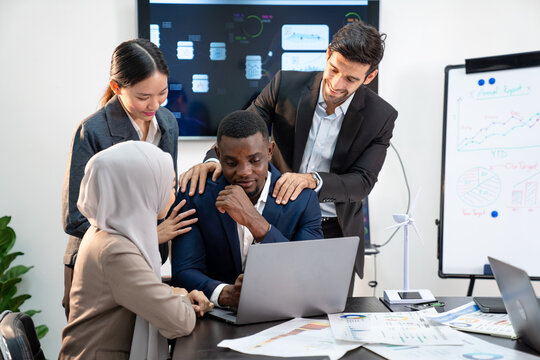 team of multiethnic colleague discuss budget performance planning, sharing idea for cost reduction, business people man woman diverse employee coworker in formal suit meeting in finance office